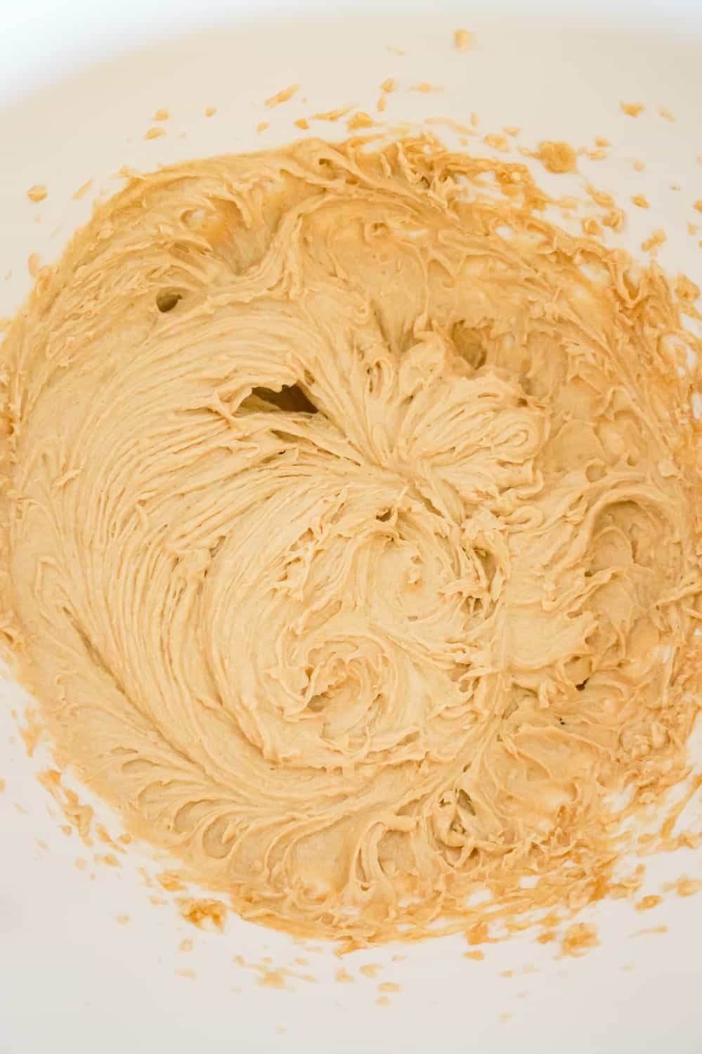 creamy peanut butter mixture in a mixing bowl