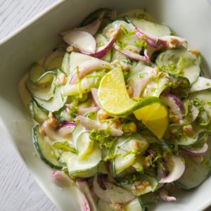 Creamy Cucumber Salad with Lime is a delicious summer side dish recipe using English cucumbers, fresh limes, red onions and chopped walnuts.