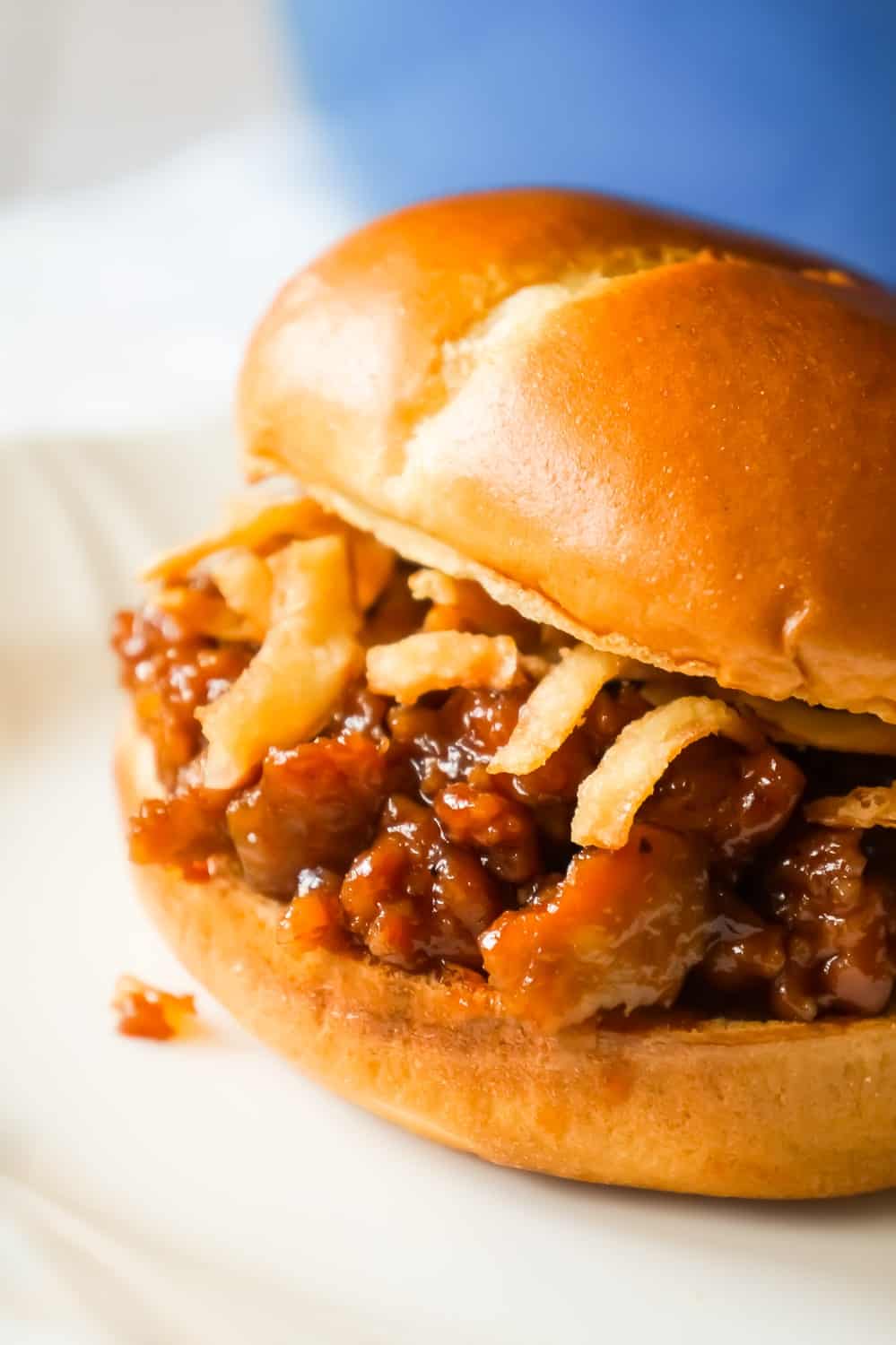 Dr Pepper Pork Sloppy Joes are an easy dinner recipe using ground pork sausage meat and diced onions cooked in Dr Pepper and BBQ sauce.