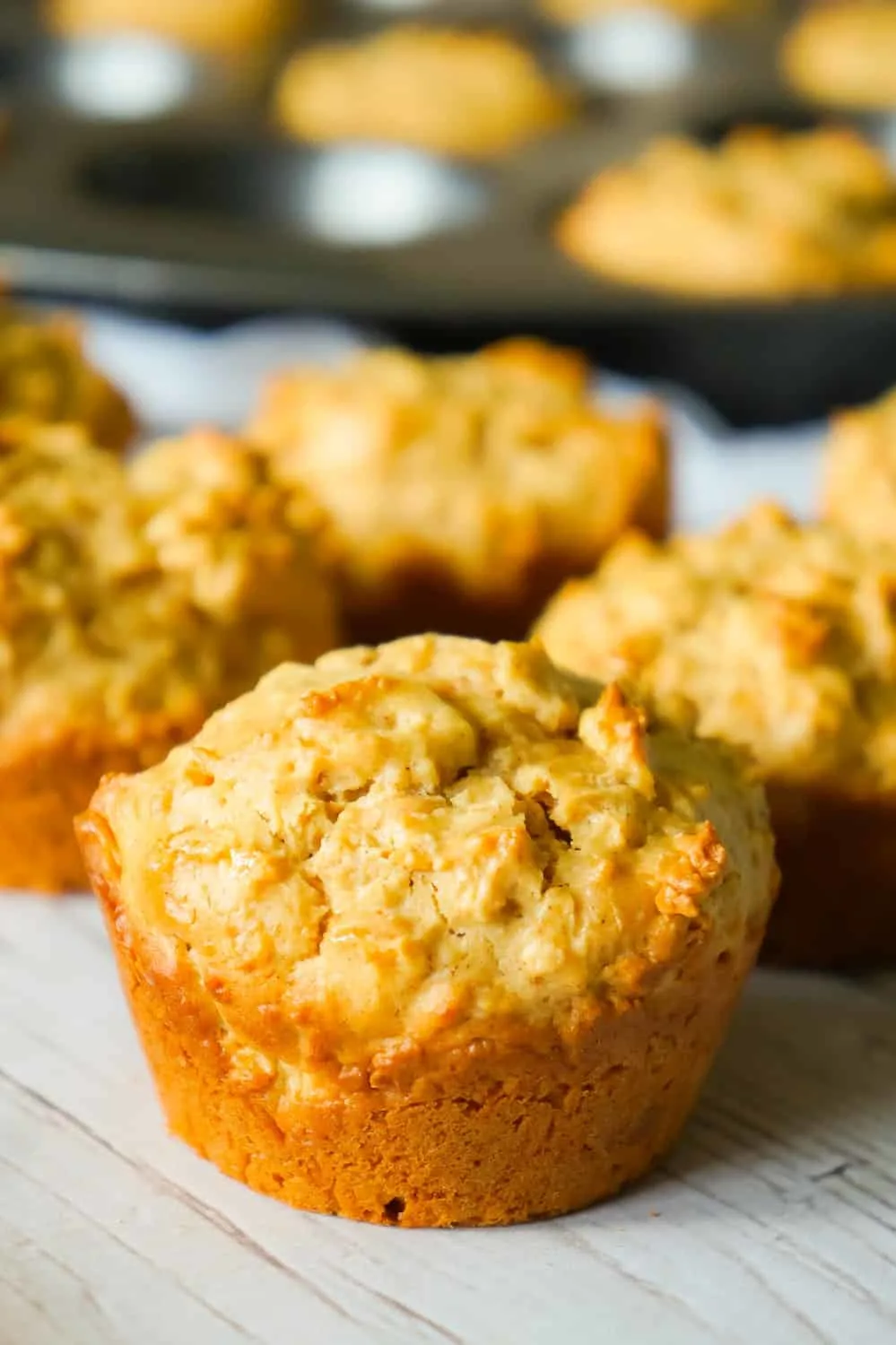 Pumpkin Spice Peanut Butter Oatmeal Muffins are a delicious fall treat loaded with pumpkin pie spice, smooth peanut butter and Reese's peanut butter baking chips.