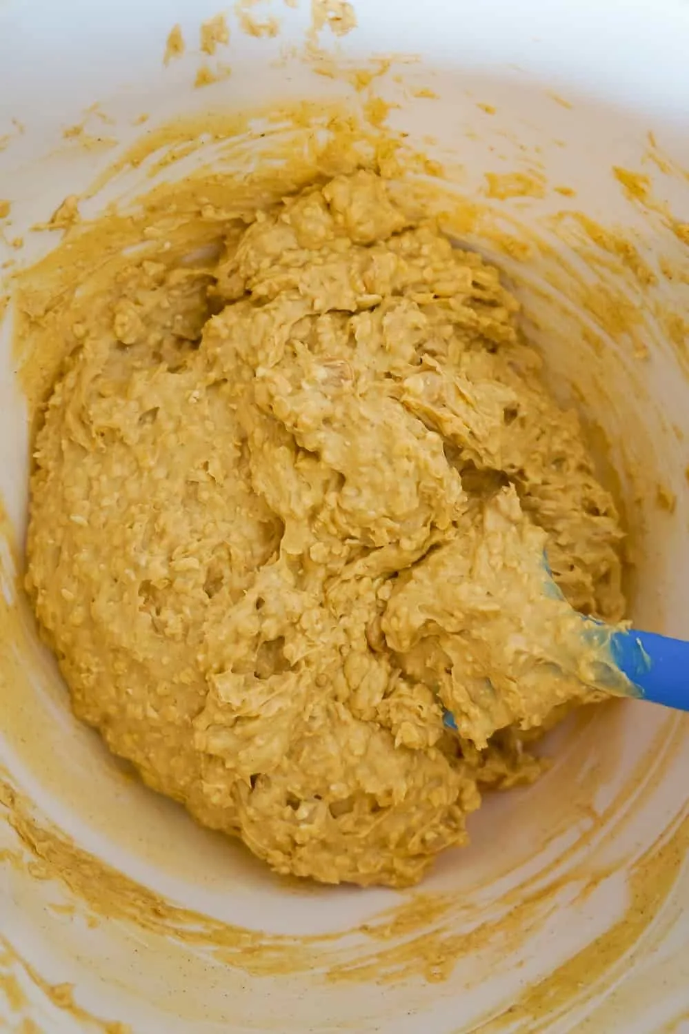 pumpkin spice muffin batter in a mixing bowl