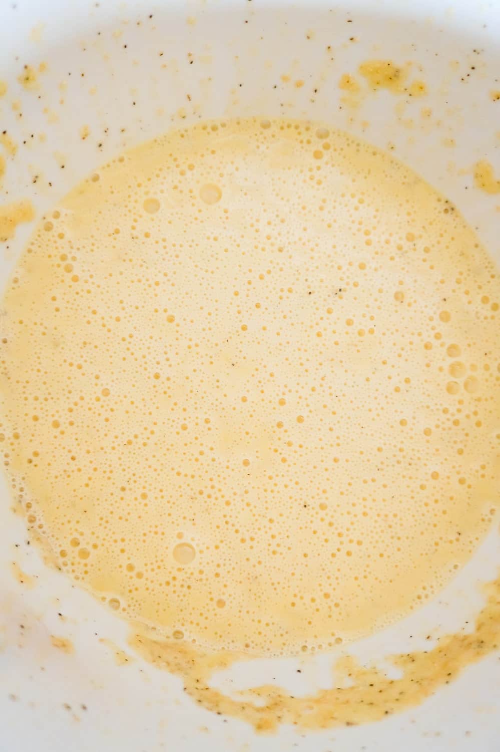 beaten eggs in a mixing bowl