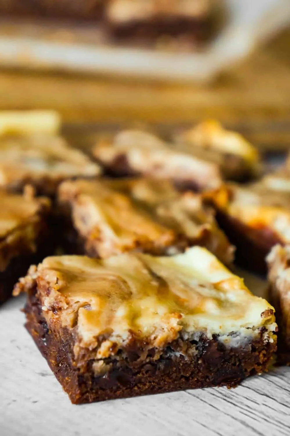 Brownies with Cream Cheese are a decadent chocolate dessert loaded with chocolate chips and a rich cheesecake swirl.