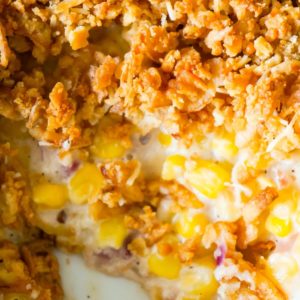 Cream Corn Casserole is an easy side dish recipe loaded with cream of bacon soup, red onions, Parmesan cheese, Ritz crackers and French's fried onions.