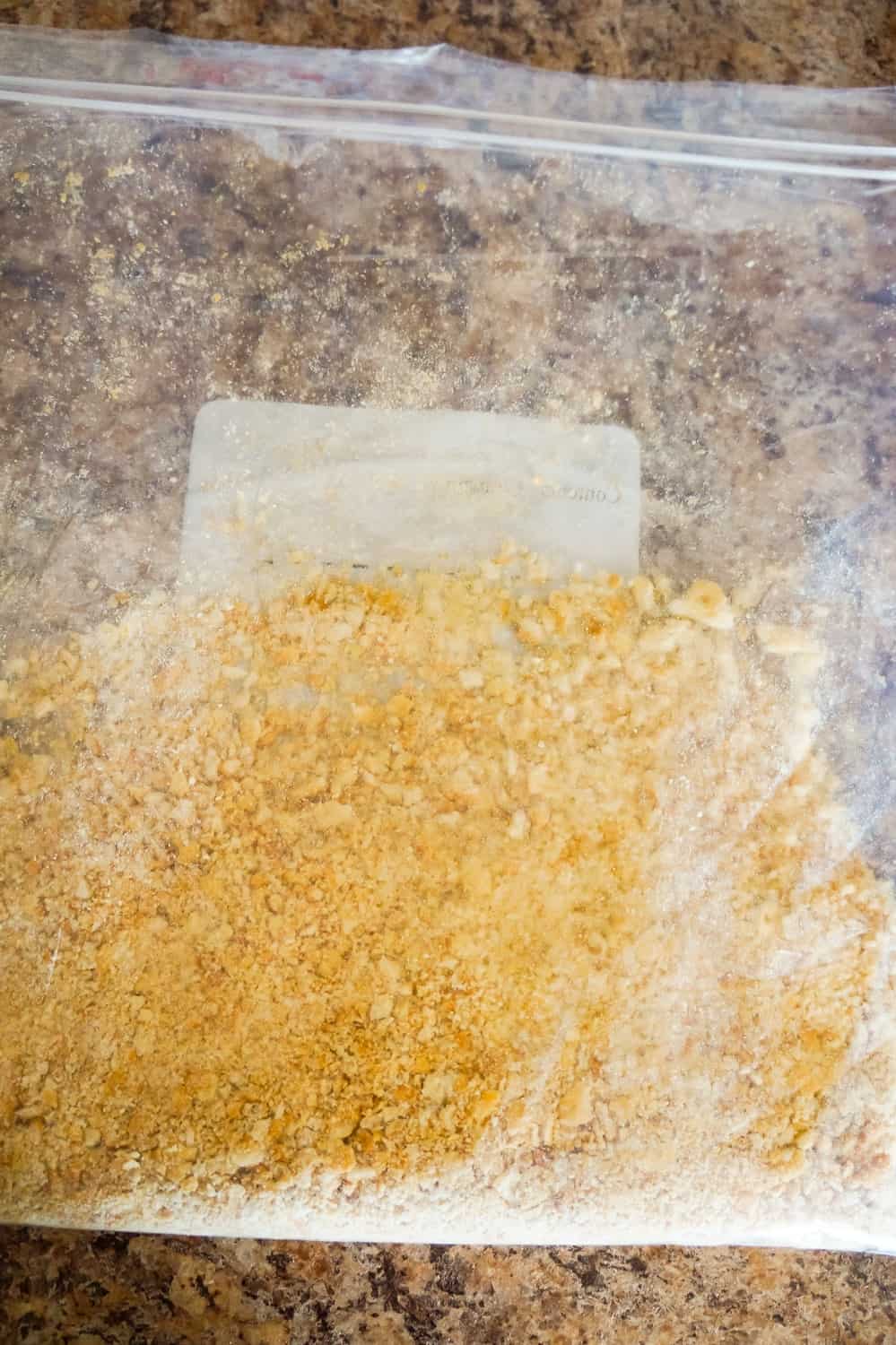 Ritz cracker crumbs in a Ziploc bag