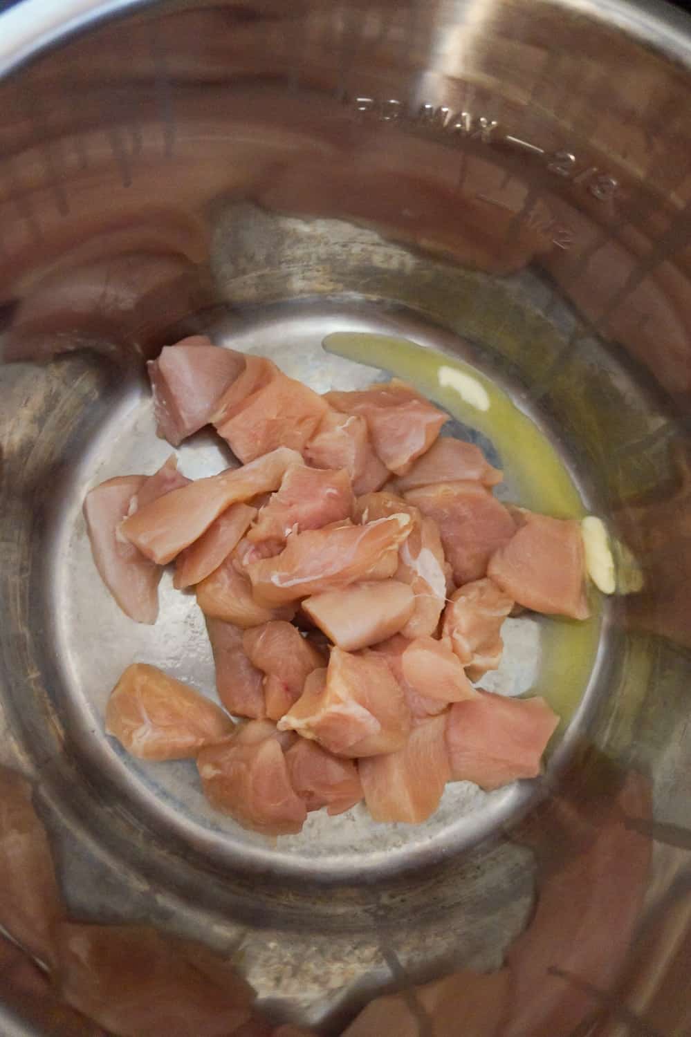 raw chicken breast chunks in an Instant Pot