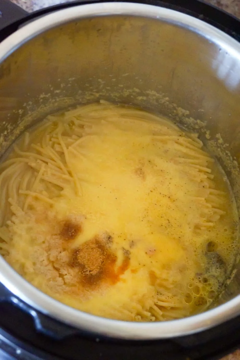 chicken spaghetti in an Instant Pot before stirring