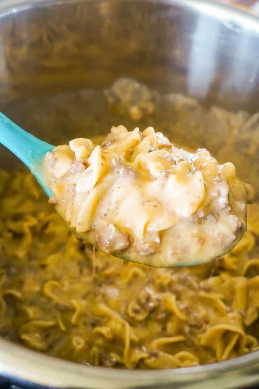 Instant Pot Cheesy Ground Beef and Noodles is an easy pressure cooker dinner recipe using hamburger meat and egg noodles loaded with mozzarella and cheddar cheese.