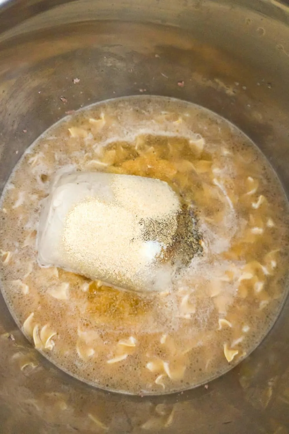 condensed cream of mushroom soup, spices, egg noodles and liquid in an Instant POt