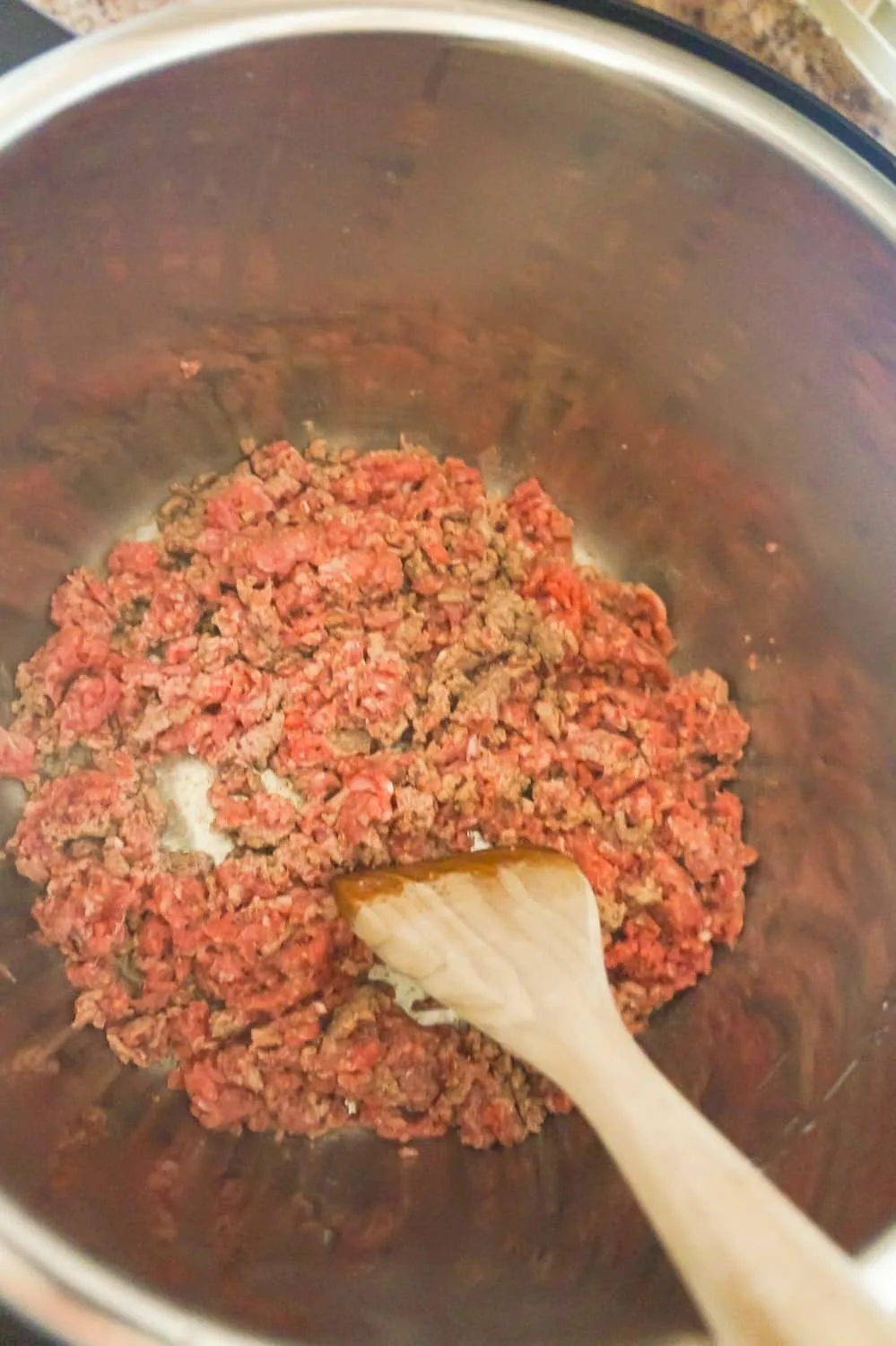 ground beef cooking in an Instant Pot