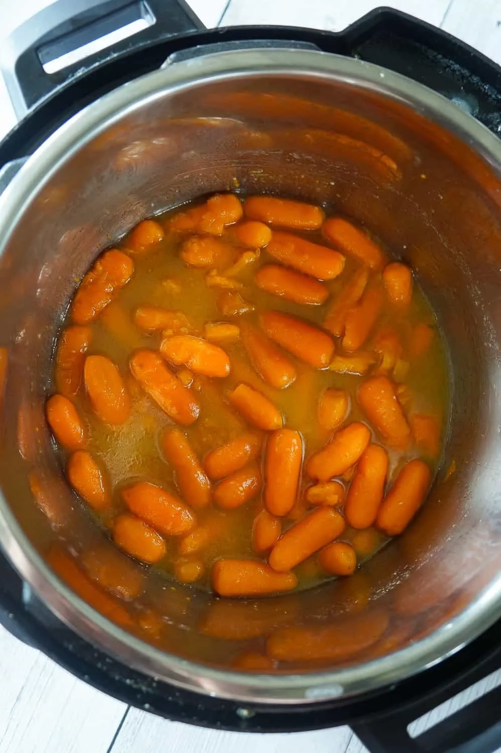 Instant Pot Glazed Carrots are an easy pressure cooker side dish recipe using butter, brown sugar, garlic puree and Worcestershire sauce.