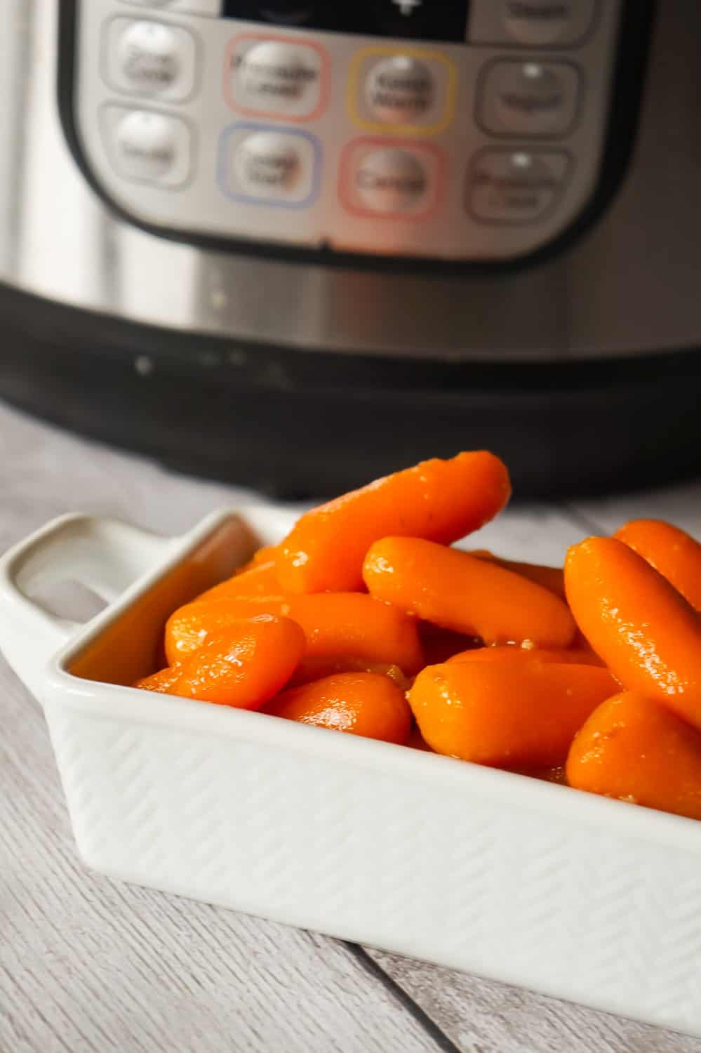 Instant Pot Glazed Carrots are an easy pressure cooker side dish recipe using butter, brown sugar, garlic puree and Worcestershire sauce.