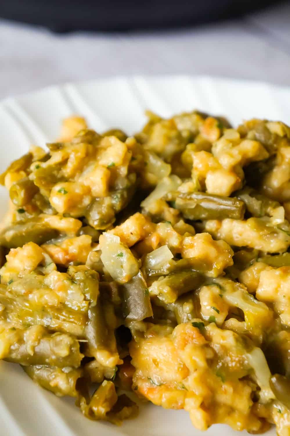 Instant Pot Green Bean Casserole with Stuffing is an easy pressure cooker side dish recipe made with cut green beans, cream of mushroom soup and Stove Top stuffing mix.