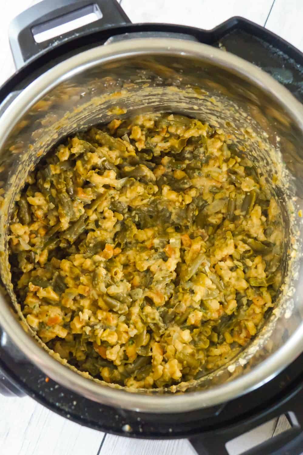 Instant Pot Green Bean Casserole with Stuffing is an easy pressure cooker side dish recipe made with cut green beans, cream of mushroom soup and Stove Top stuffing mix.