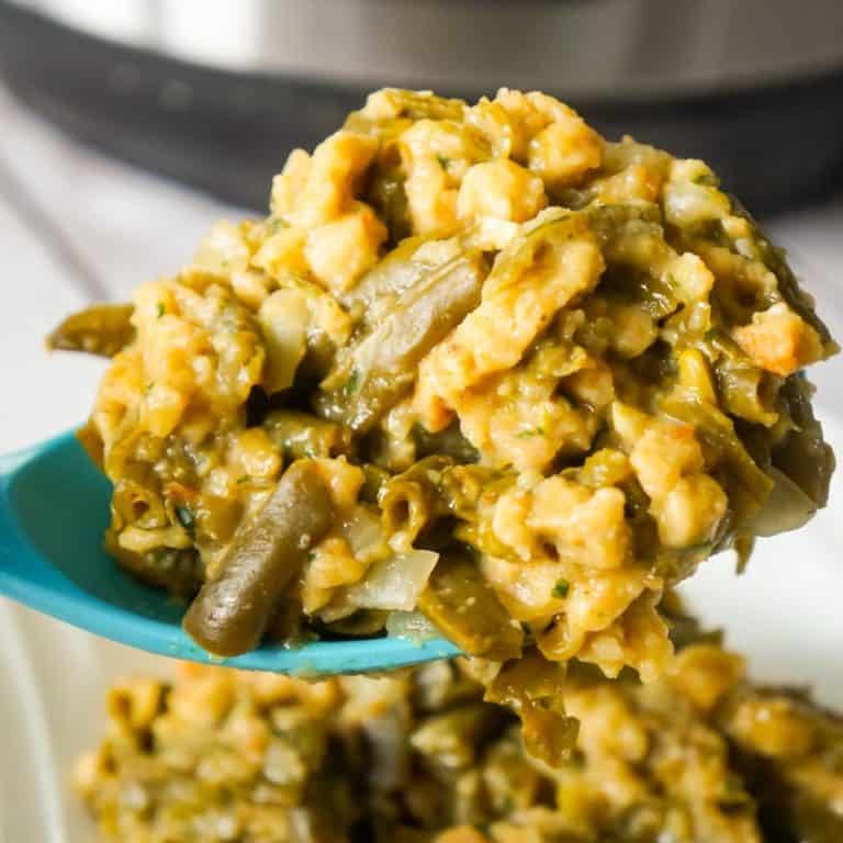 Instant Pot Green Bean Casserole with Stuffing is an easy pressure cooker side dish recipe made with cut green beans, cream of mushroom soup and Stove Top stuffing mix.