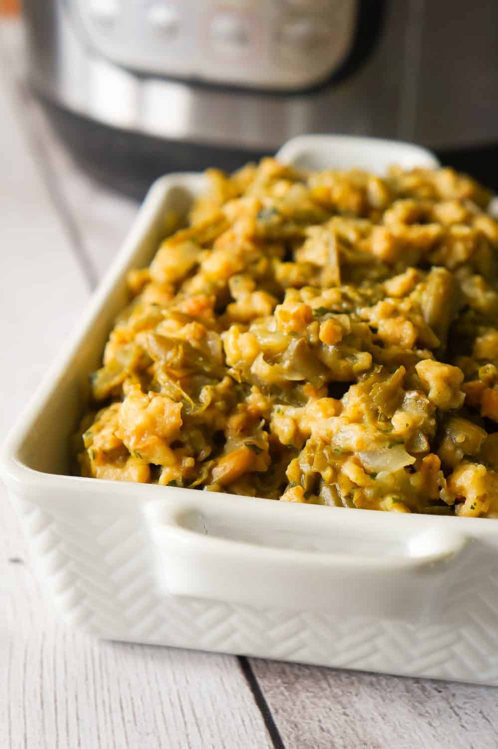 Instant Pot Green Bean Casserole with Stuffing is an easy pressure cooker side dish recipe made with cut green beans, cream of mushroom soup and Stove Top stuffing mix.