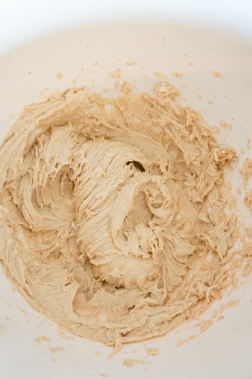 pumpkin spice cream cheese mixture in a mixing bowl