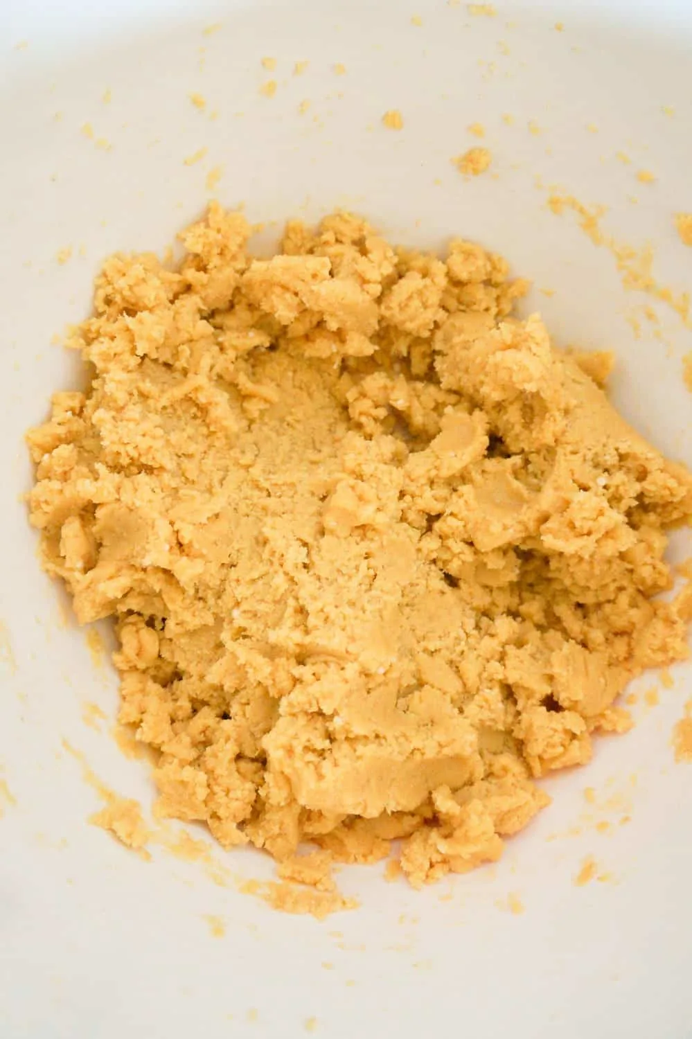 peanut butter banana pudding sugar cookie dough in a mixing bowl