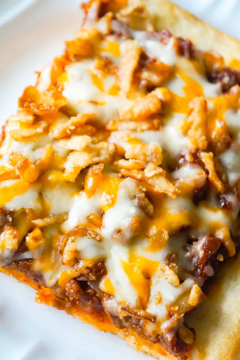 Sloppy Joe Pizza is an easy ground beef dinner recipe using Pillsbury pizza crust and homemade sloppy joe sauce.