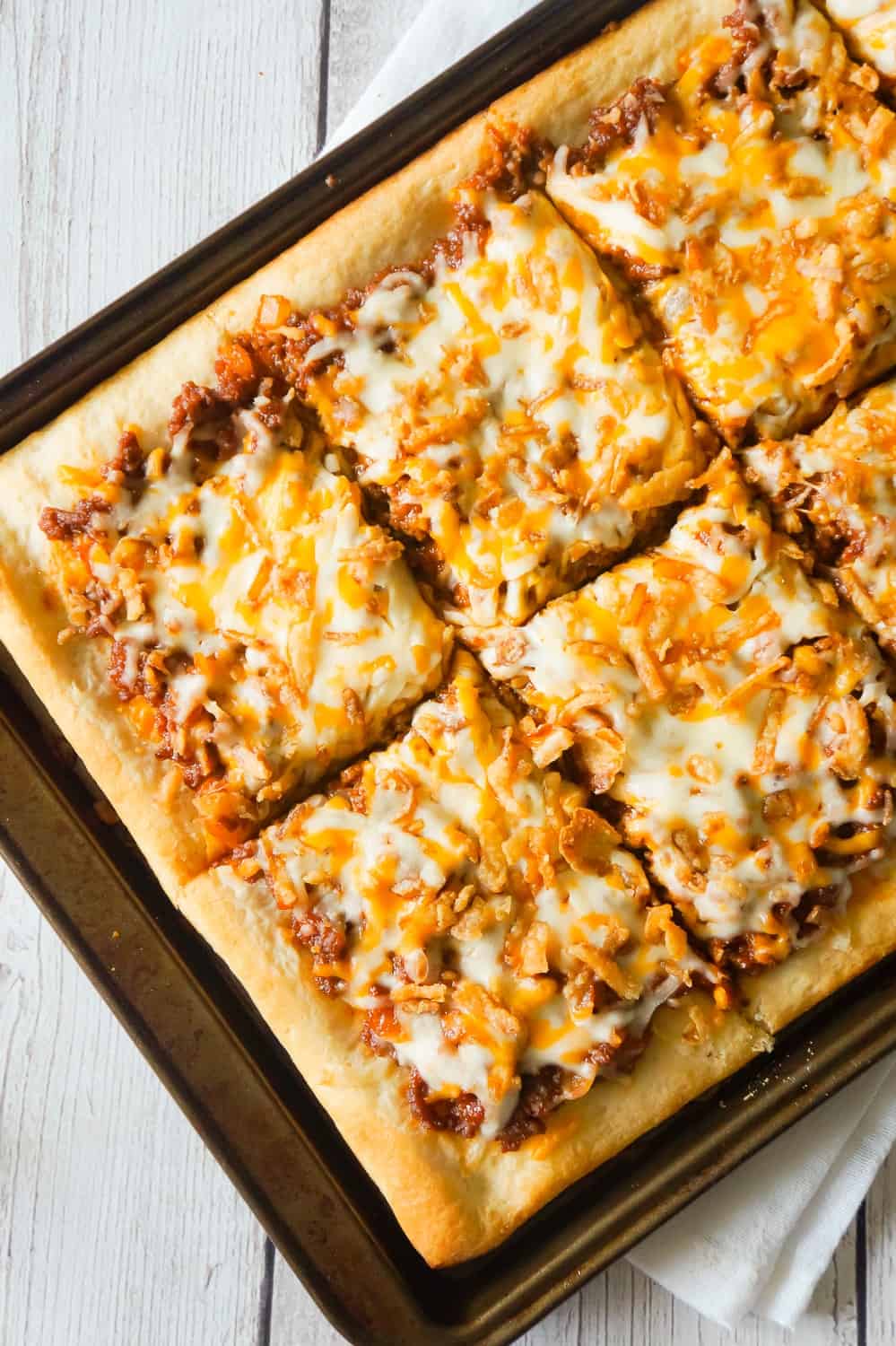 Sloppy Joe Pizza is an easy ground beef dinner recipe using Pillsbury pizza crust and homemade sloppy joe sauce.