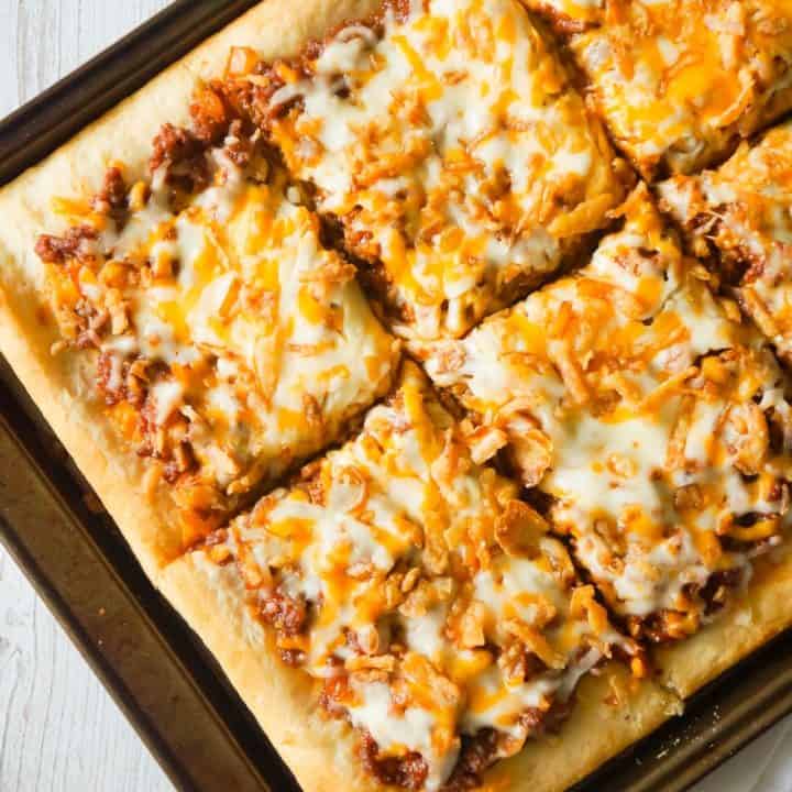 Sloppy Joe Pizza is an easy ground beef dinner recipe using Pillsbury pizza crust and homemade sloppy joe sauce.