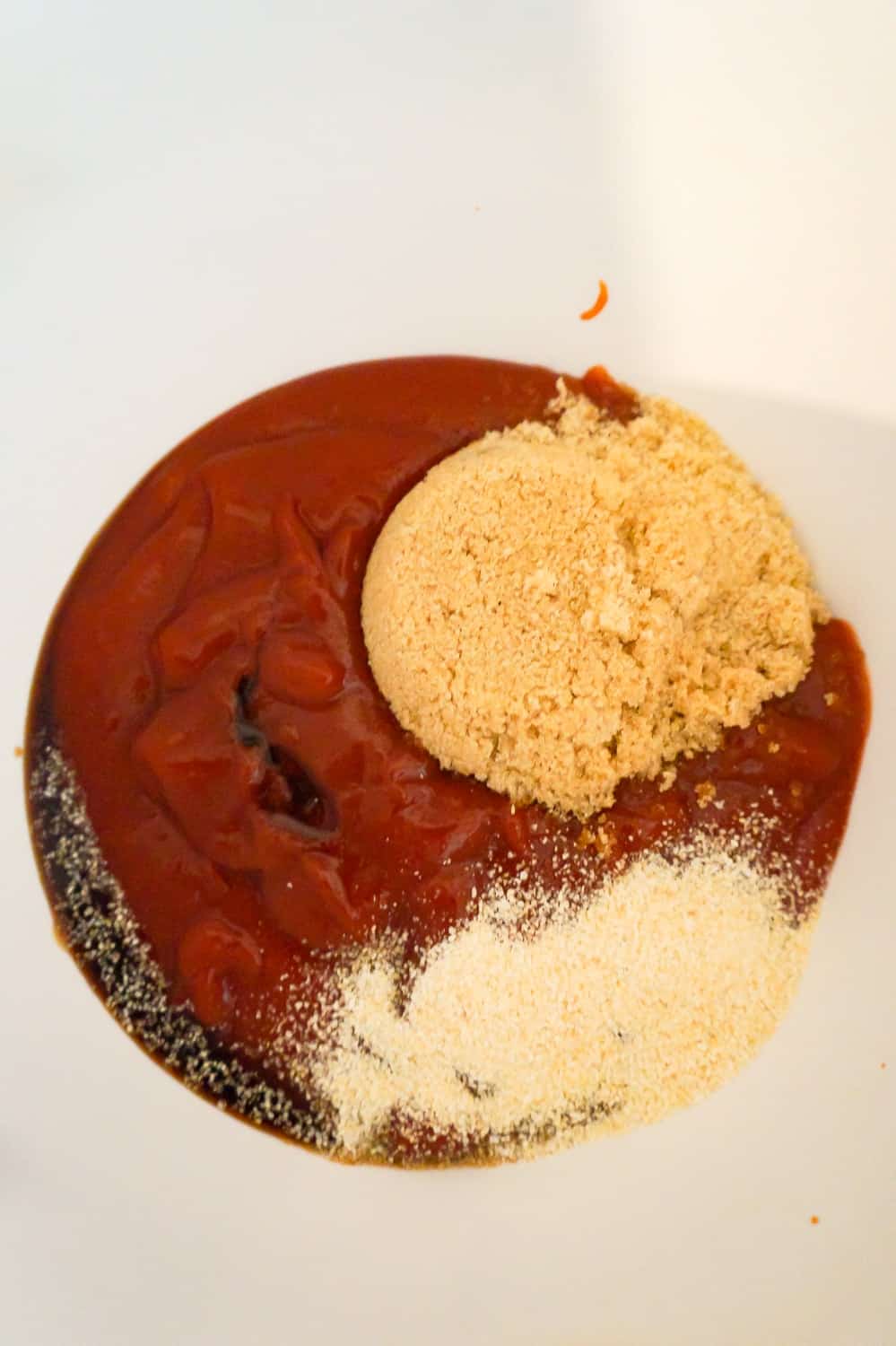 ketchup, brown sugar, Worcestershire and onion powder in a mixing bowl