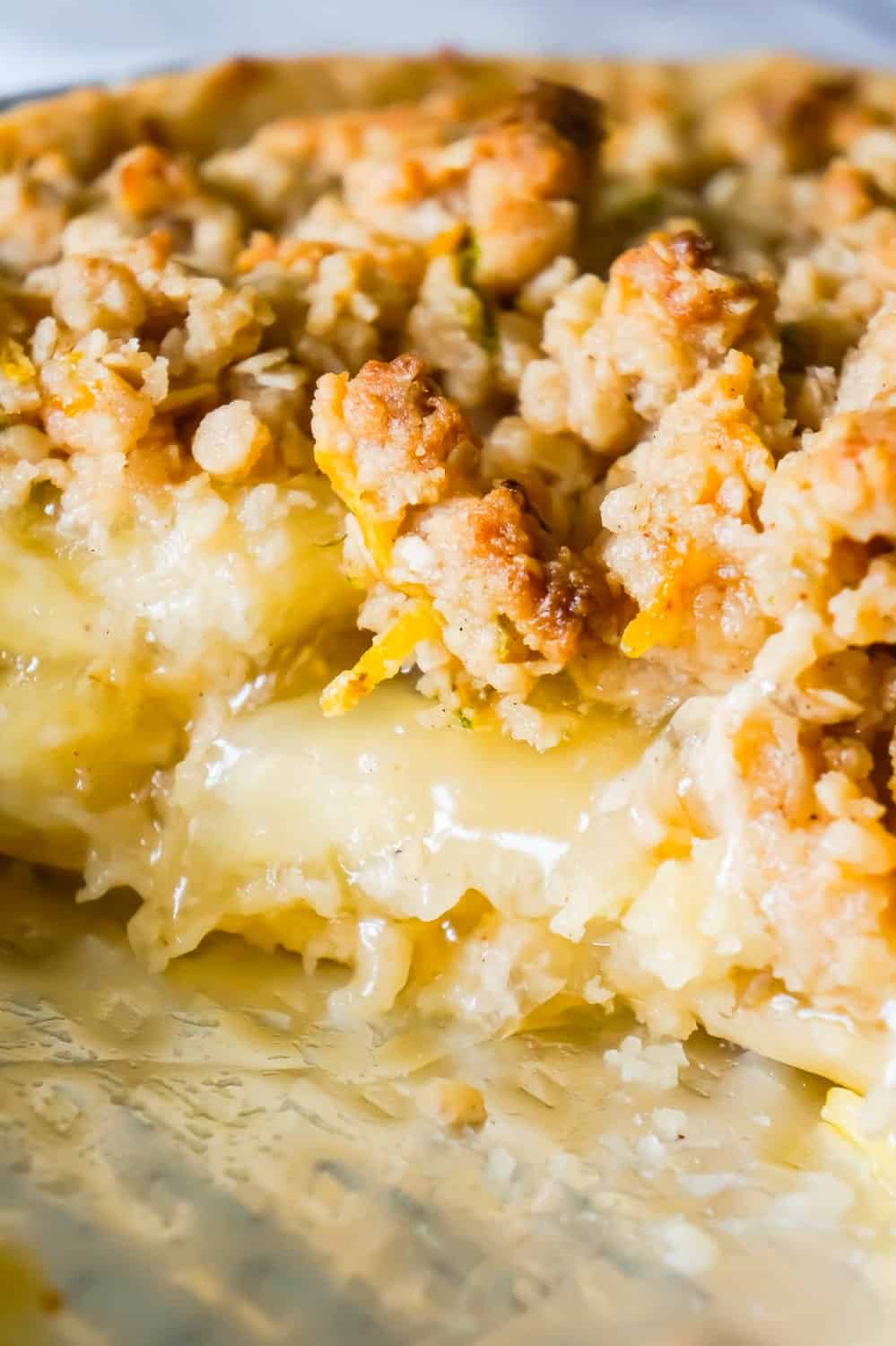 Apple Pie with Crumble Topping is an easy apple pie recipe using store bought crust and pie filling topped with a homemade crumble topping with hints of cinnamon and citrus.