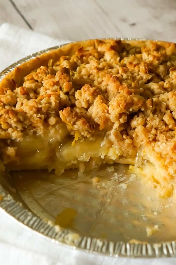 Apple Pie with Crumble Topping is an easy apple pie recipe using store bought crust and pie filling topped with a homemade crumble topping with hints of cinnamon and citrus.