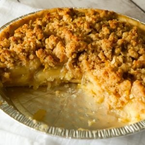 Apple Pie with Crumble Topping is an easy apple pie recipe using store bought crust and pie filling topped with a homemade crumble topping with hints of cinnamon and citrus.