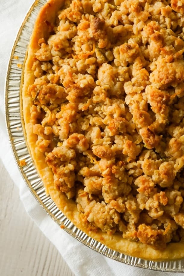 Apple Pie with Crumble Topping is an easy apple pie recipe using store bought crust and pie filling topped with a homemade crumble topping with hints of cinnamon and citrus.