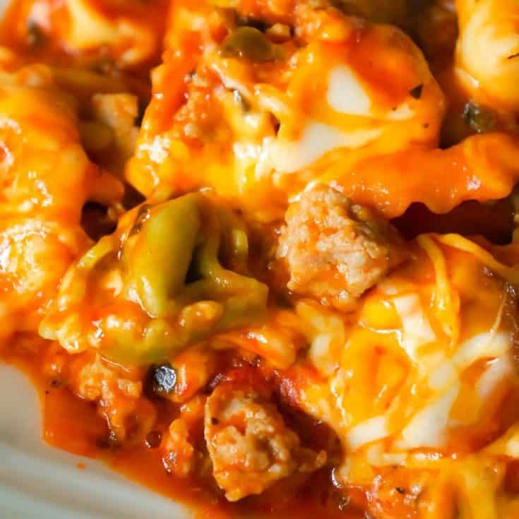 Cheesy Tortellini with Sausage is an easy one pot dinner recipe loaded with ground sausage meat and topped with mozzarella and cheddar cheese.