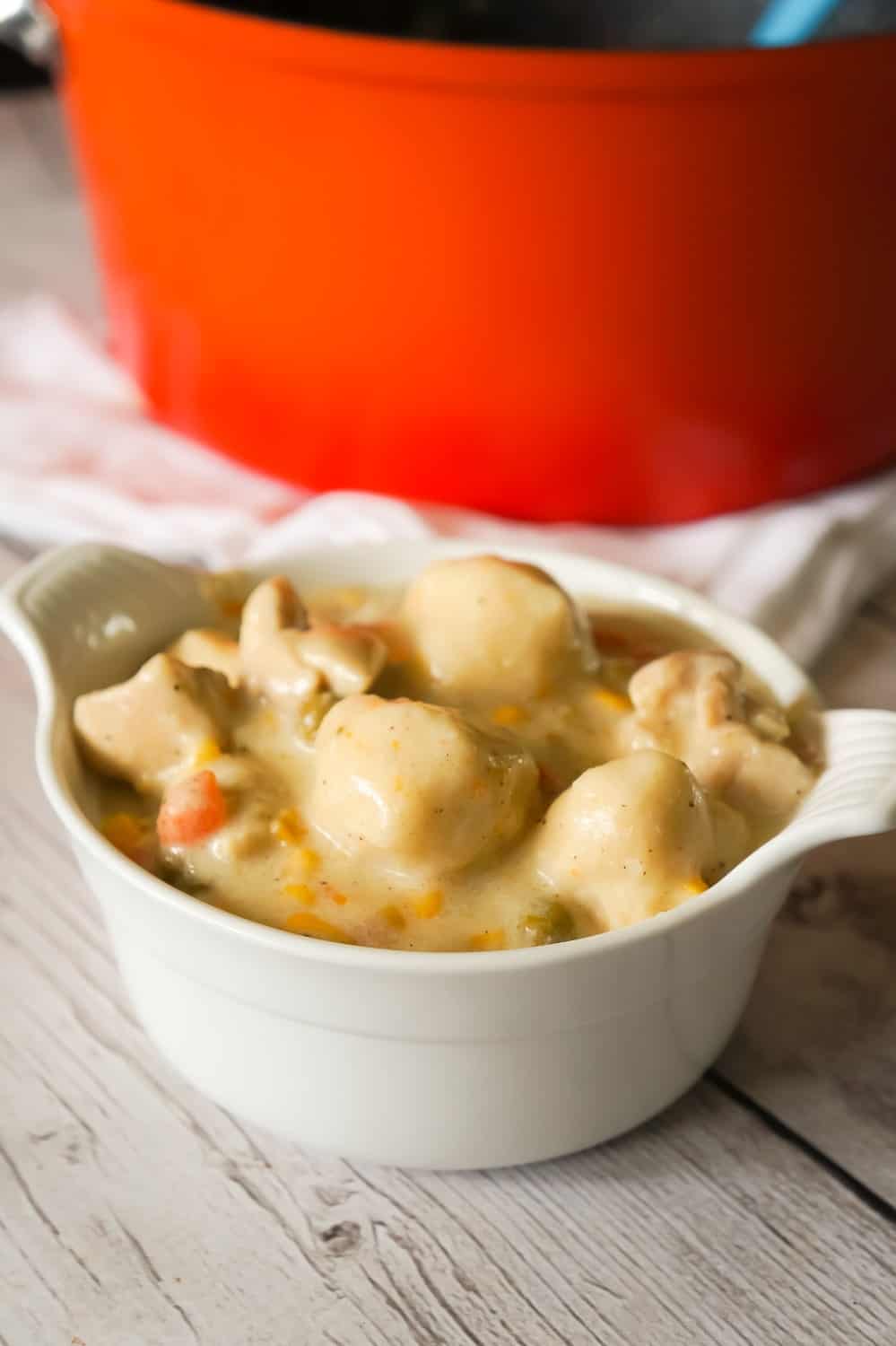 Chicken and Dumplings with Bisquick is a hearty comfort food dish loaded with pieces of chicken, carrots, peas, corn and dumplings made from Bisquick.