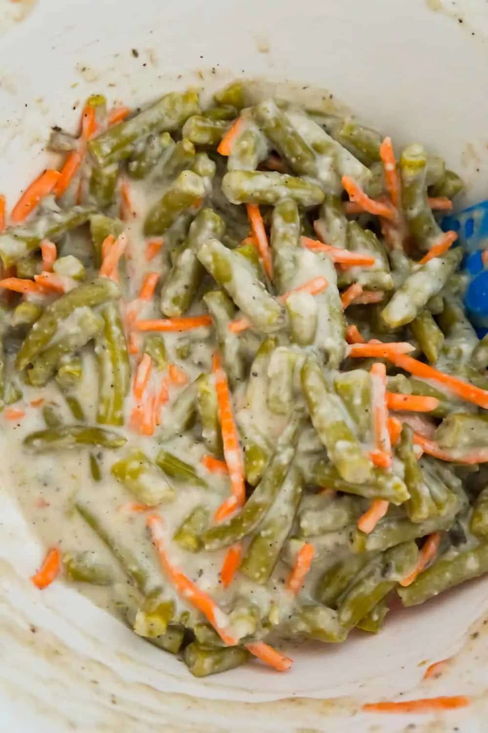 green bean, carrot and mushroom soup mixture in a mixing bowl