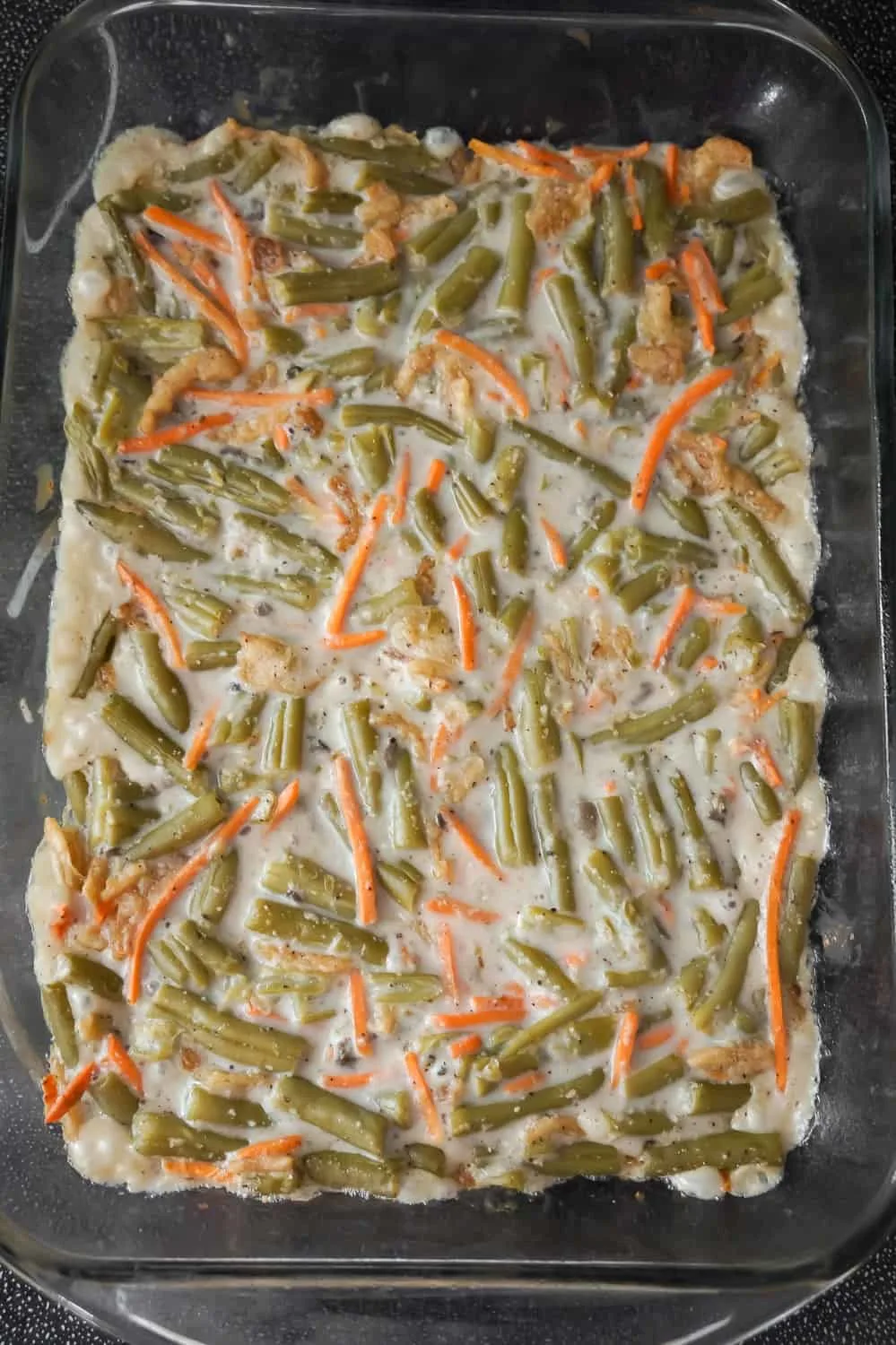 green beans, carrots and mushrooms soup mixture in a 9 x 13 inch baking dish
