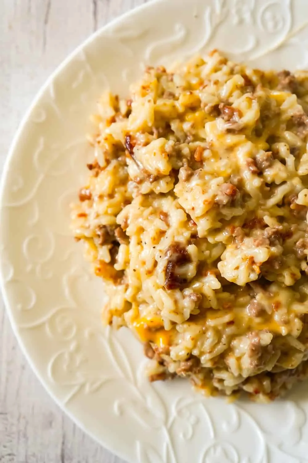 Instant Pot Bacon Cheeseburger Rice is a delicious pressure cooker dinner recipe using hamburger meat and loaded with long grain rice, crumbled bacon and cheese.