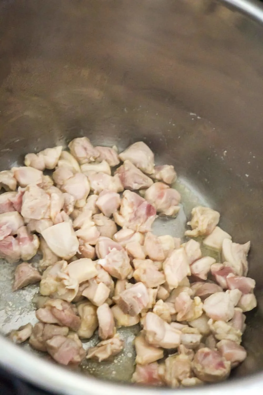 chicken pieces cooking in an Instant Pot
