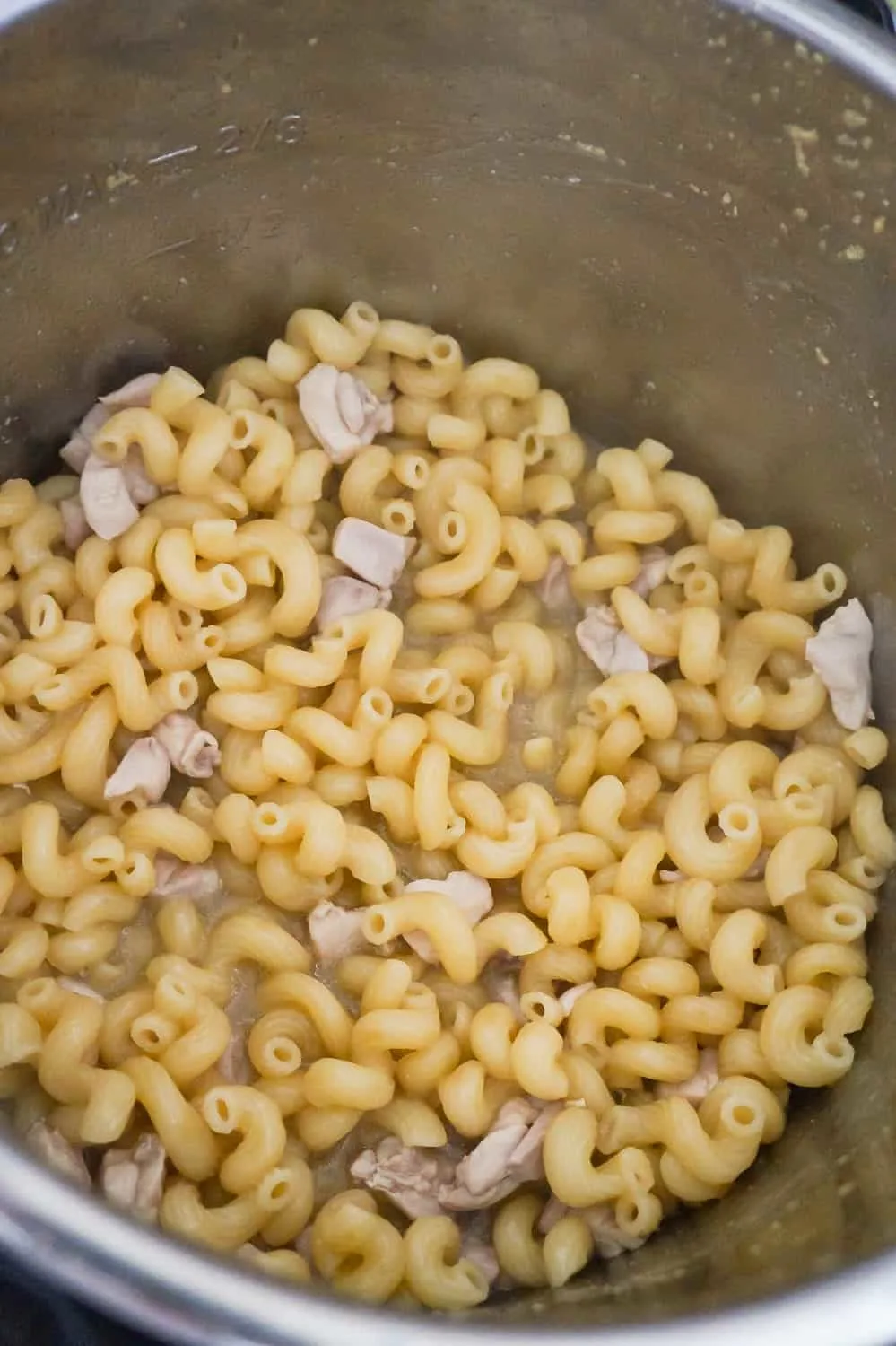 cooked chicken chunks and pasta in an Instant Pot