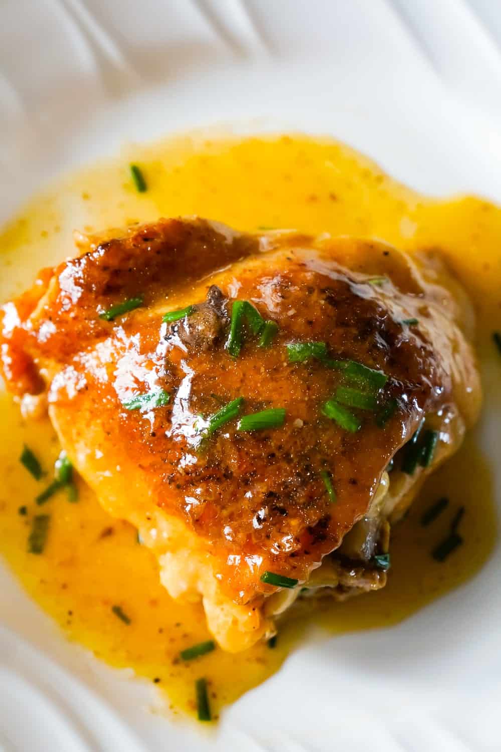 Instant Pot Chicken Thighs is a delicious pressure cooker chicken recipe with gravy cooked all in one pot.