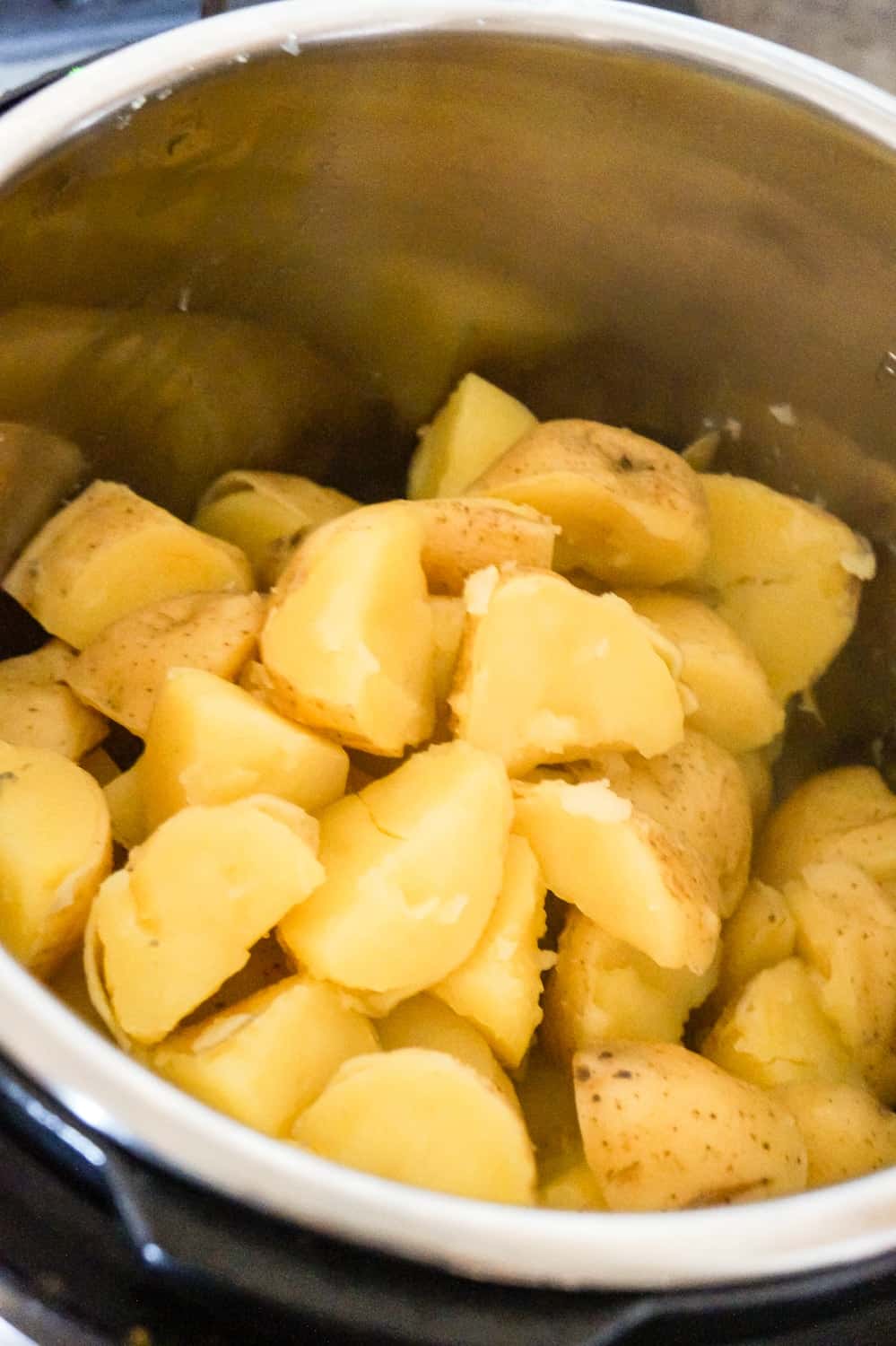 cooked potato quarters in an Instant Pot