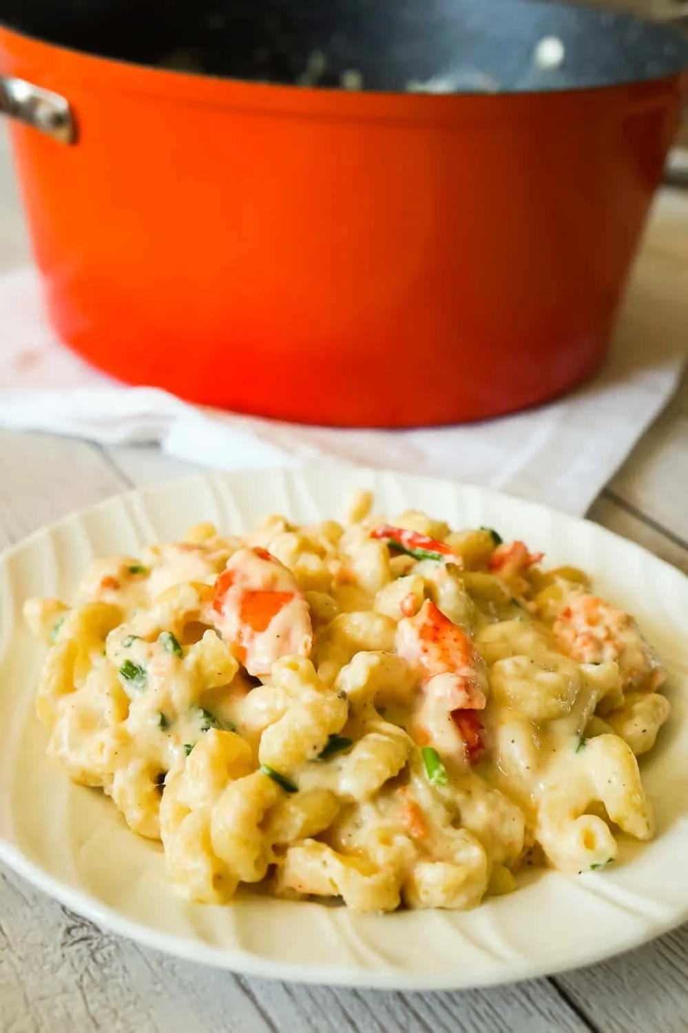 Lobster Mac and Cheese is a delicious seafood pasta recipe made with chunks of precooked lobster, mozzarella, cheddar and Swiss cheese.