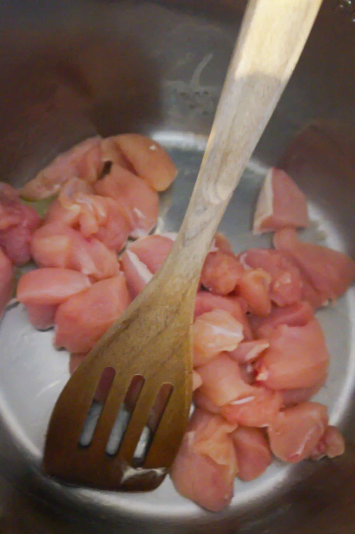 raw chicken breast chunks in an Instant Pot