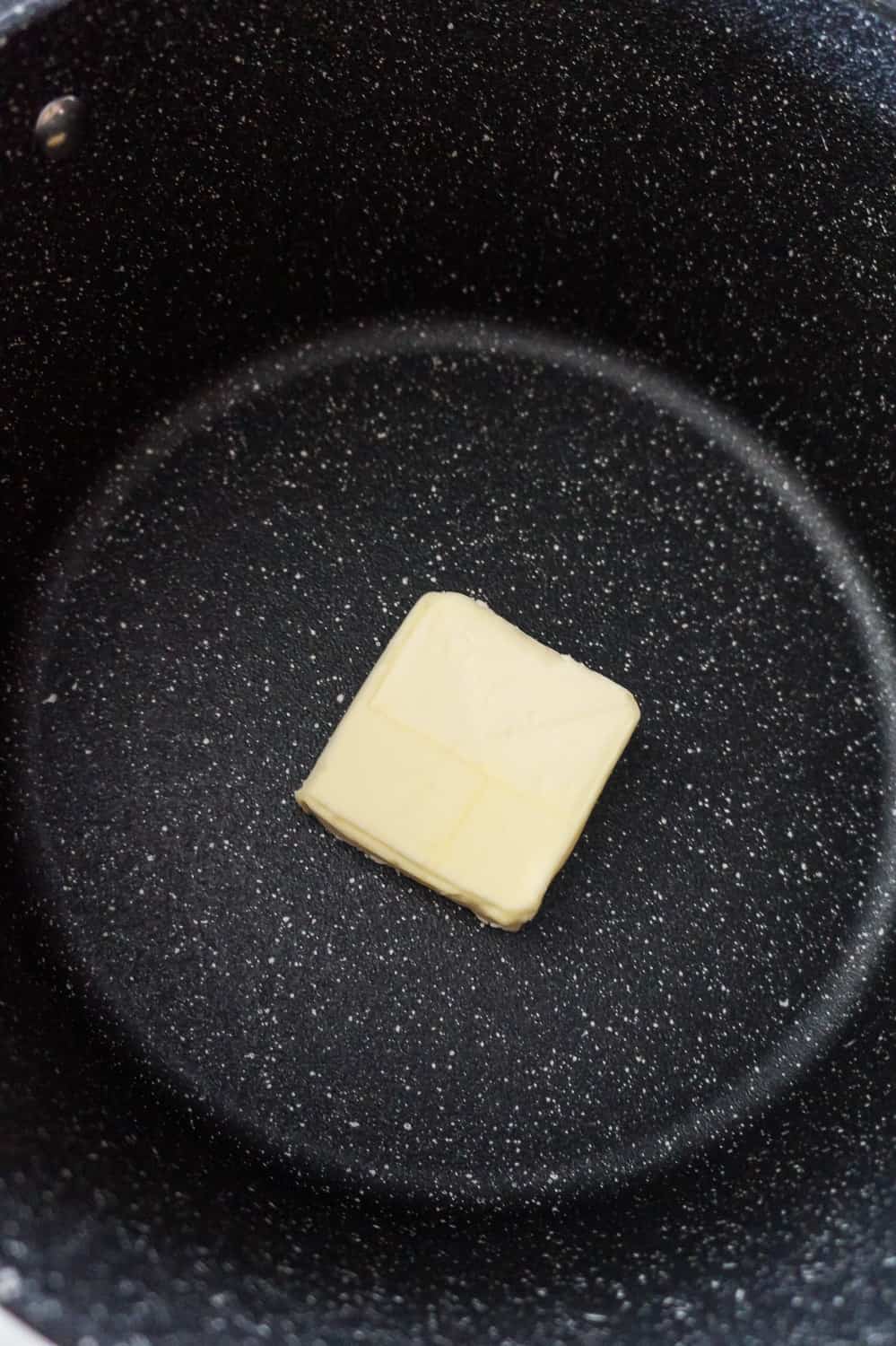 a chunk of butter in a large pot