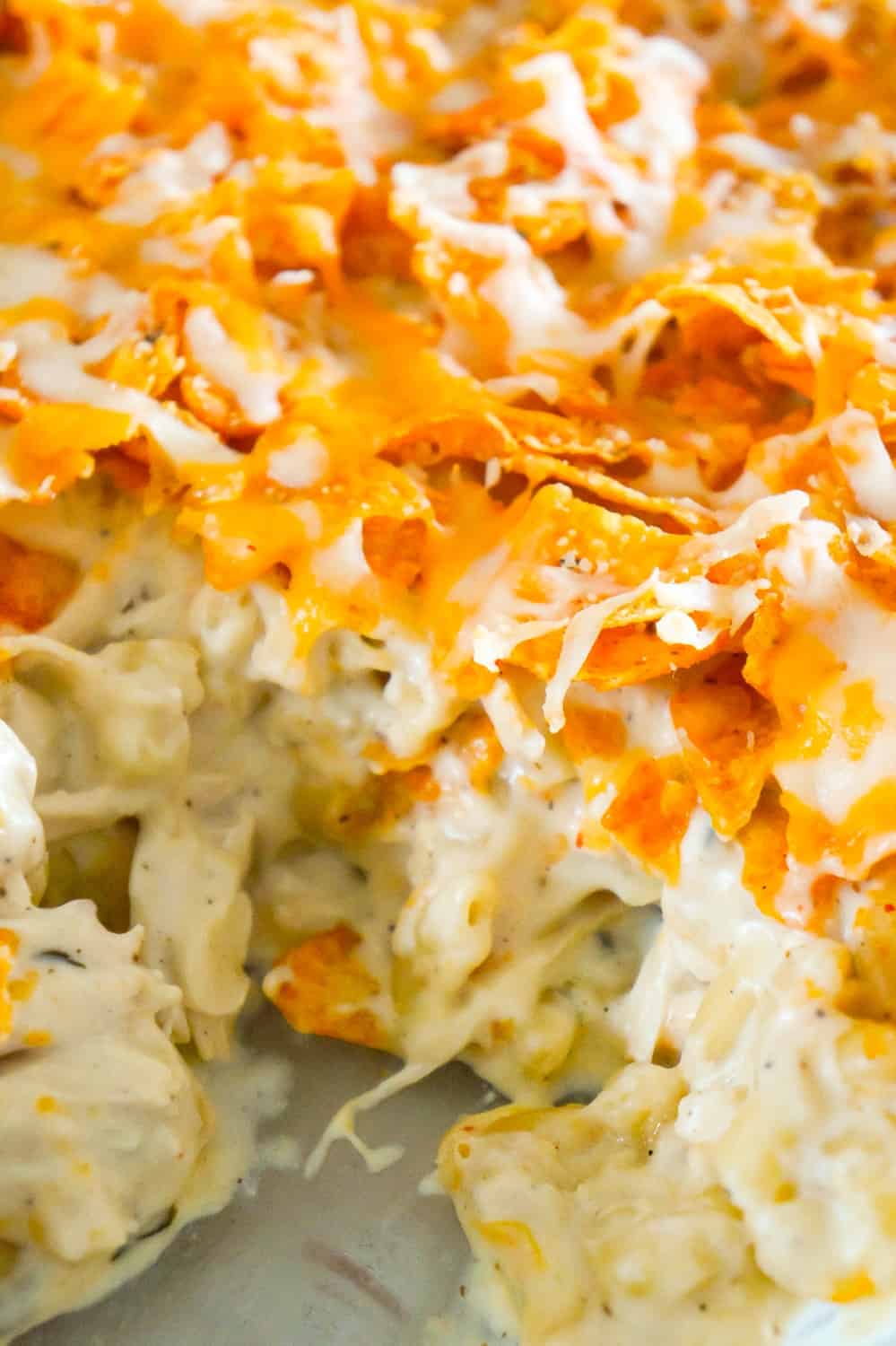 Doritos Mac and Cheese Casserole with Chicken is an easy dinner recipe that combines cheesy pasta, rotisserie chicken and Doritos nacho chips.