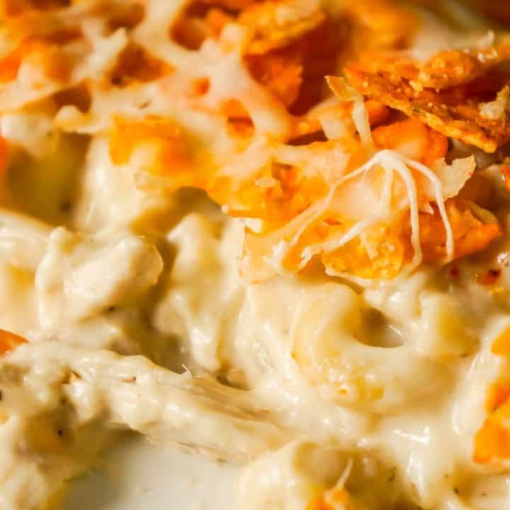 Doritos Mac and Cheese Casserole with Chicken is an easy dinner recipe that combines cheesy pasta, rotisserie chicken and Doritos nacho chips.