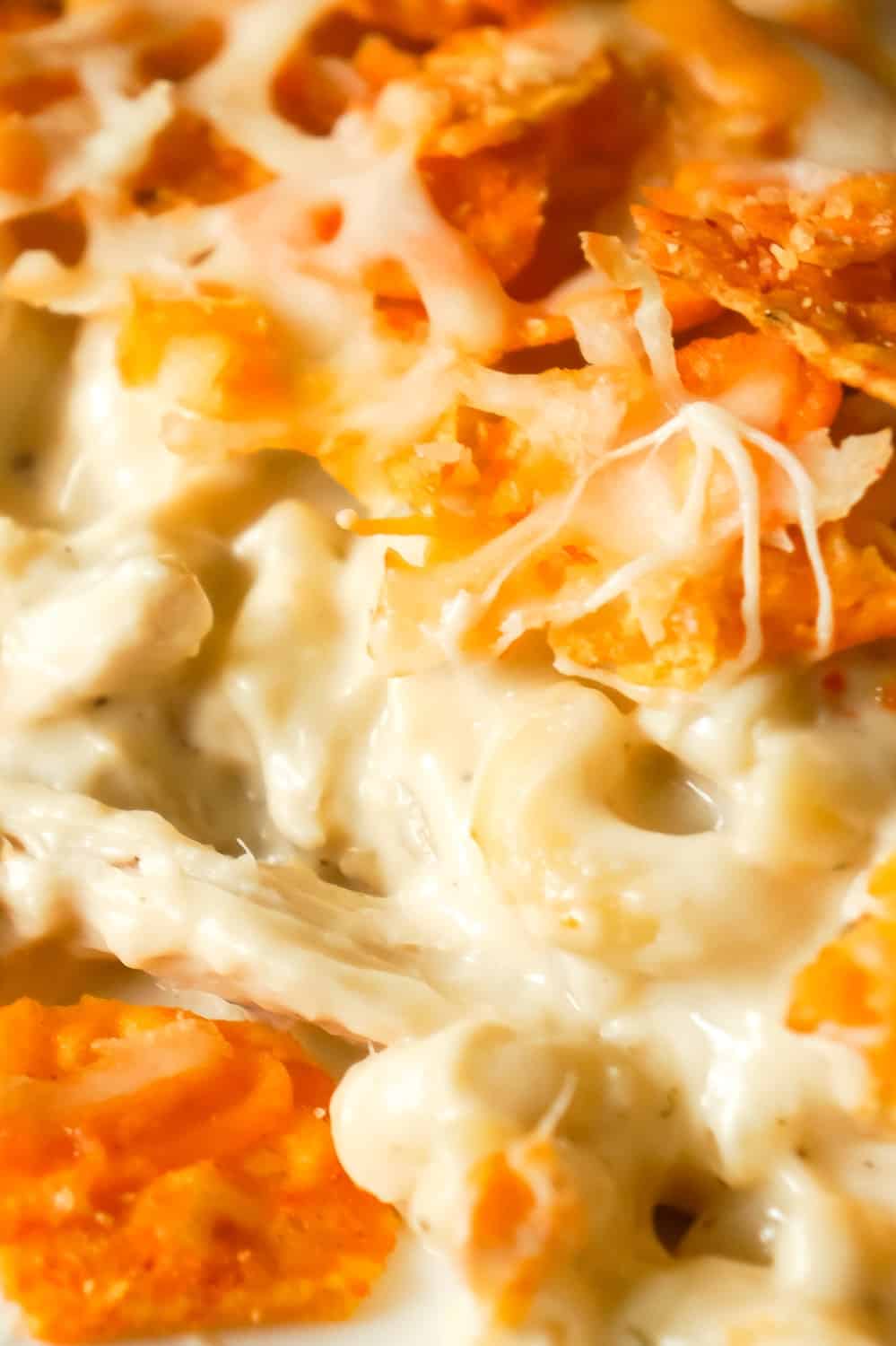 Doritos Mac and Cheese Casserole with Chicken is an easy dinner recipe that combines cheesy pasta, rotisserie chicken and Doritos nacho chips.