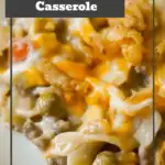 Hamburger Noodle Casserole is an easy ground beef casserole recipe loaded with egg noodles, veggies, cheese and crispy fried onions. Ground beef casserole/ easy dinner recipe/ ground beef dinner recipe