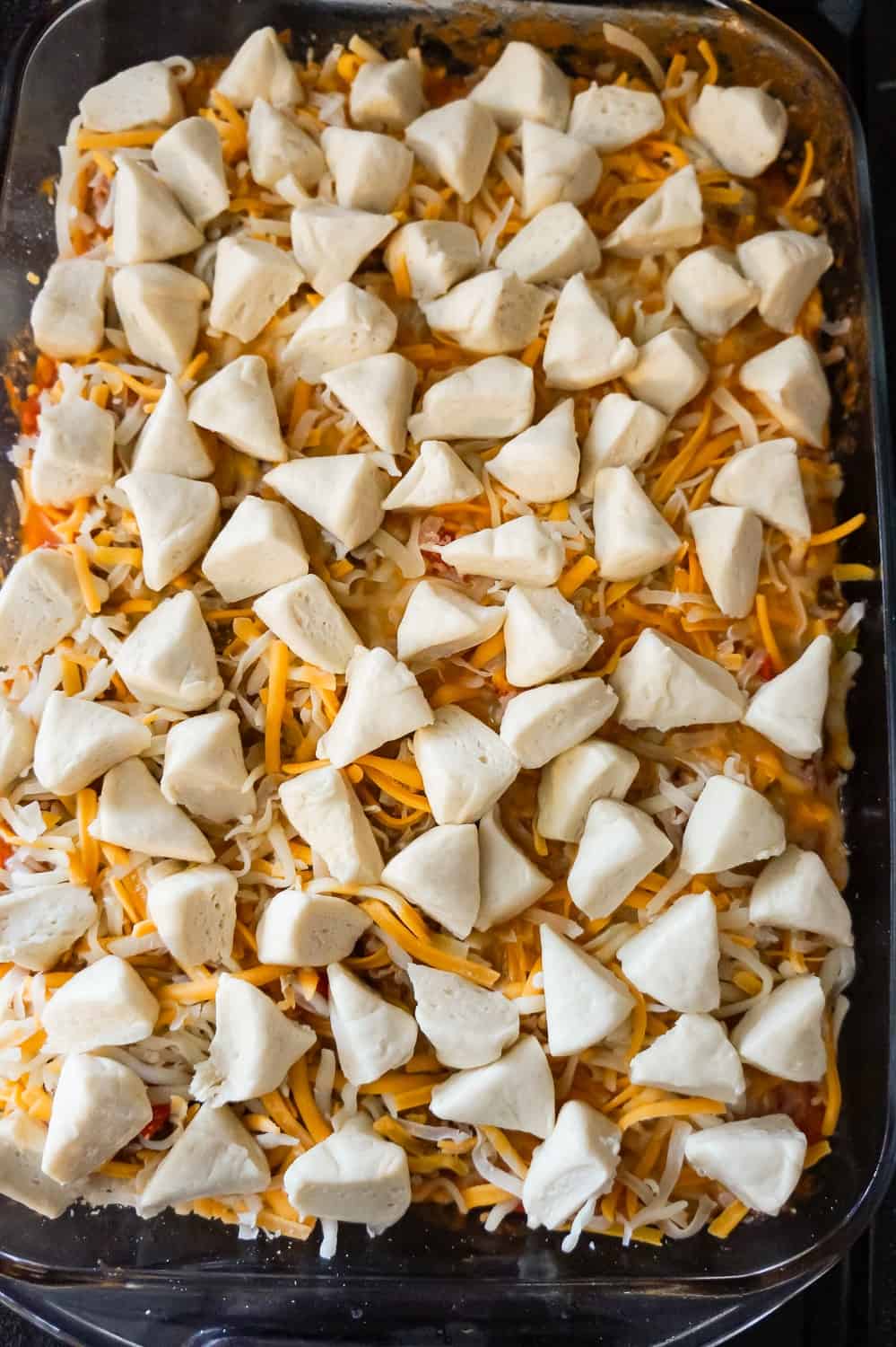 pillsbury biscuit pieces on top of meatloaf casserole before baking