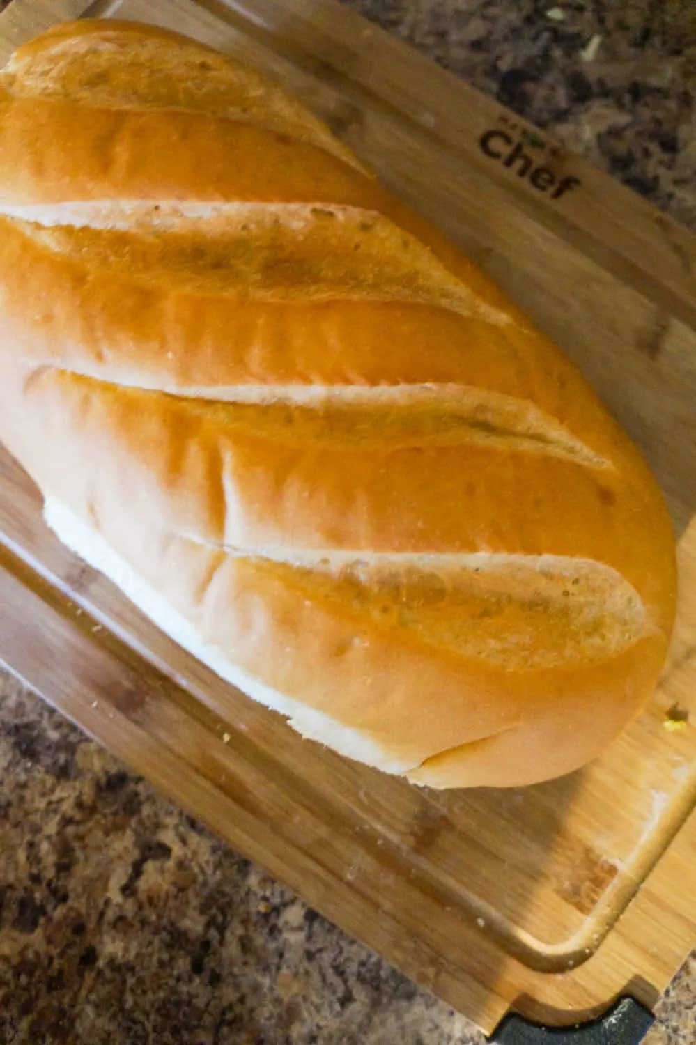 crust French bread on a cutting board