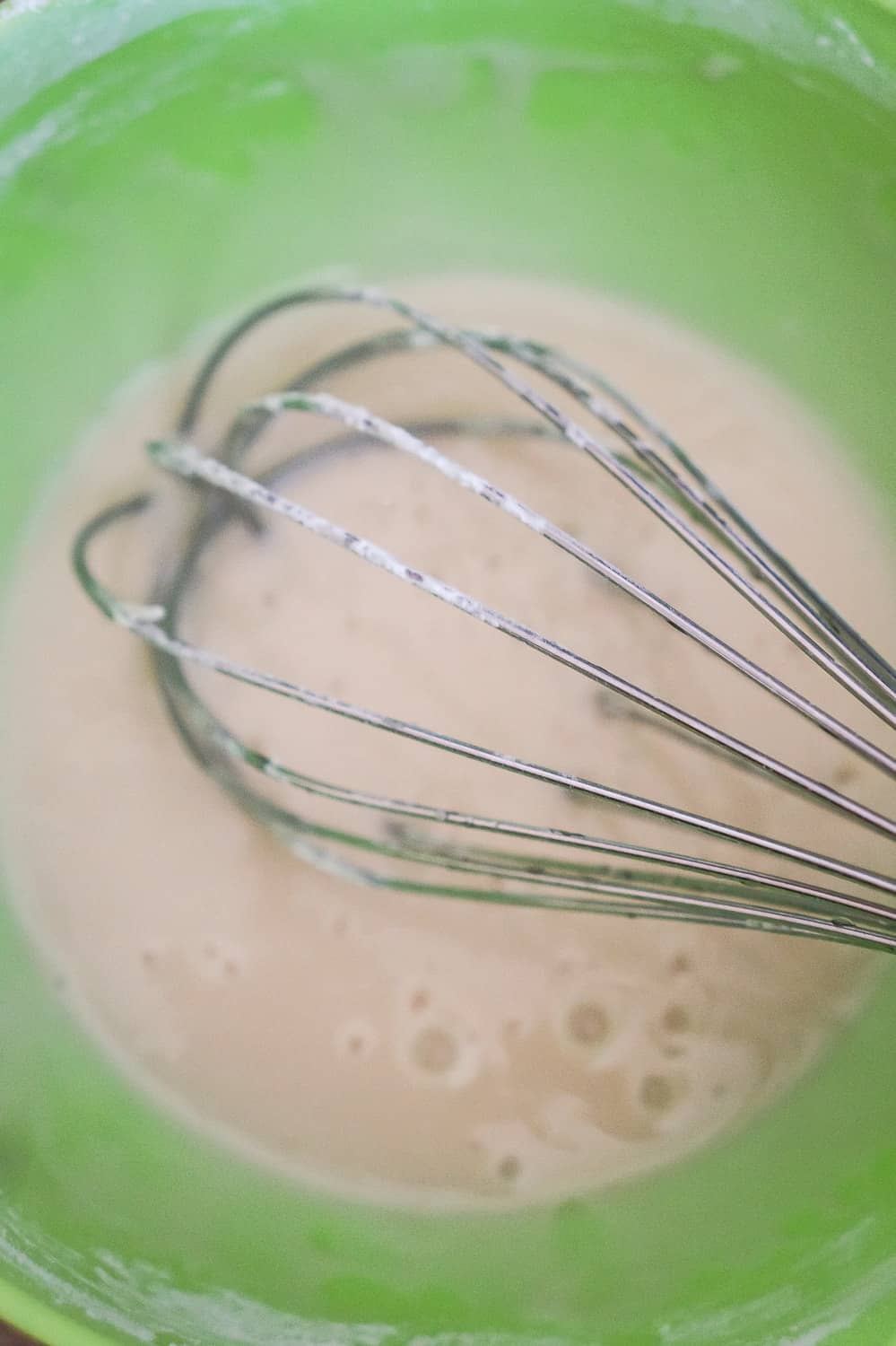 vanilla glaze in a mixing bowl