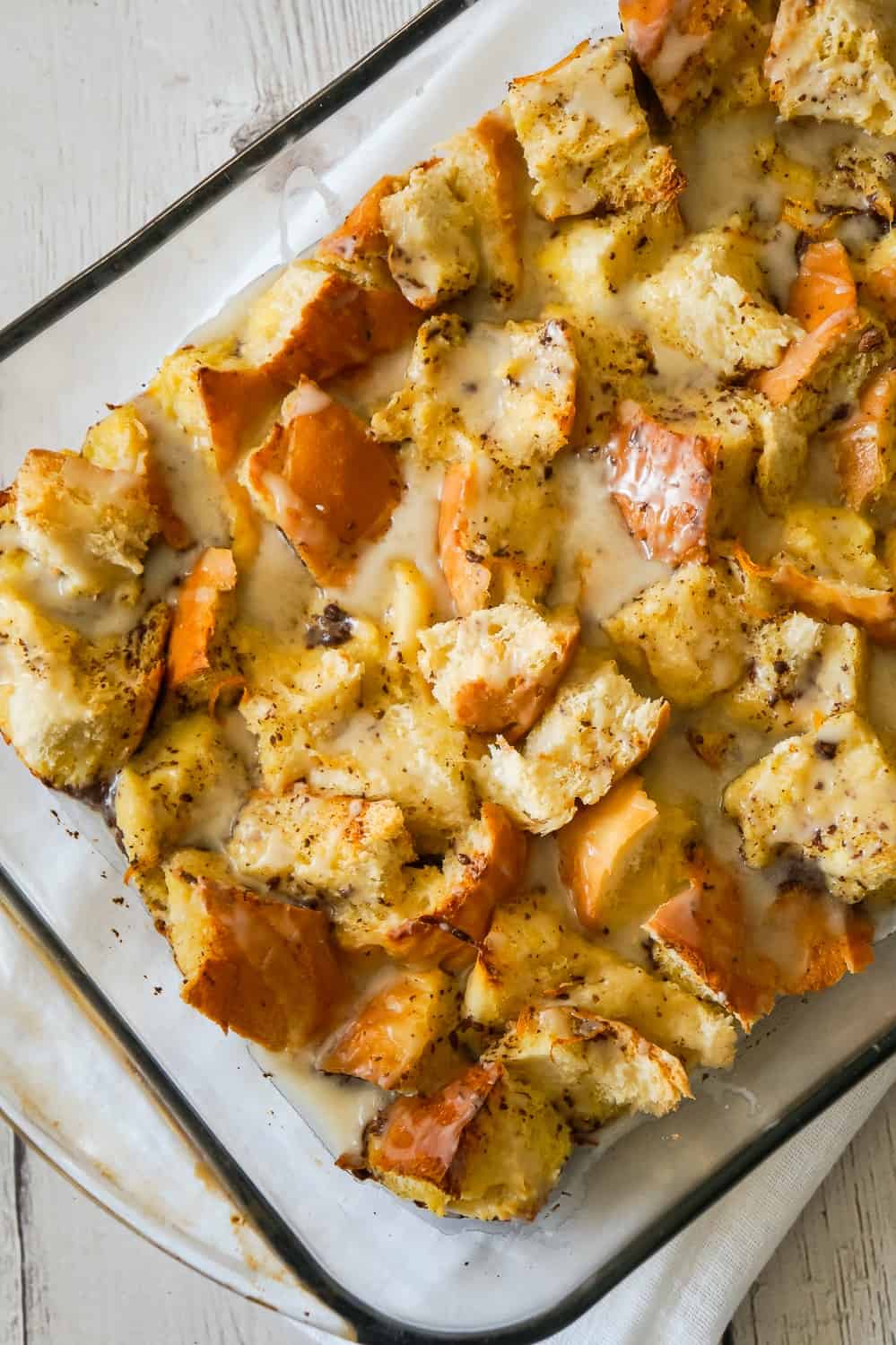 Overnight French Toast Casserole is an easy breakfast casserole recipe made with crusty French bread soaked in an egg mixture flavoured with ground cinnamon, fresh squeezed orange juice and orange zest.